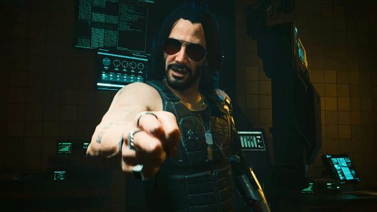 Requisitos del sistema de Cyberpunk 2077: Johny Silverhand, interpretado por Keanu Reeves, apunta directamente al jugador con su dedo.