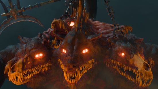 Diablo 4 alijo: un perro de tres cabezas gruñe amenazadoramente con dientes amarillos y ojos rojos brillantes.