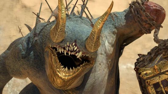 El Diablo 4 Avarice, el Maldito del Oro, un demonio con cuernos, sin ojos y con filas de dientes afilados y una gran cantidad de armas clavadas en su piel azul y obesa